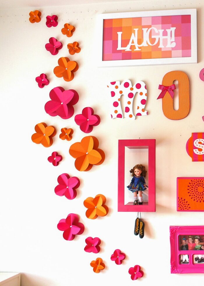 Little girl room with paper wall flowers