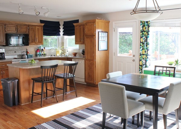 Simple updates and affordable accessories transform this bland and boring rental kitchen into a fun and functional space to dine, cook, and entertain!