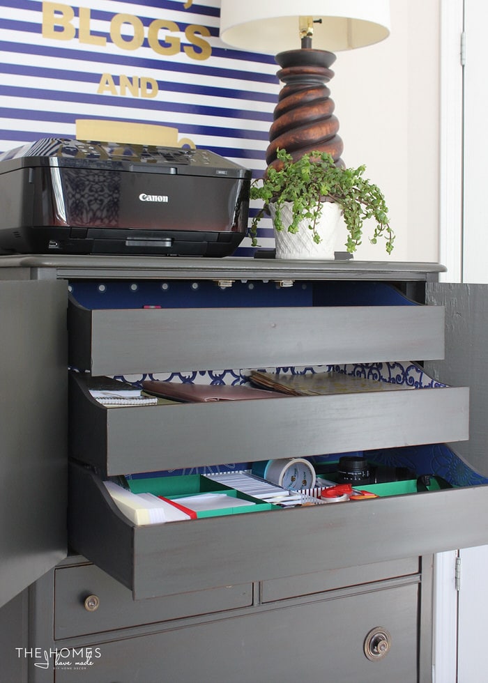 Check out this fresh, modern and bold home office full of great organization solutions fora multitude of craft and office supplies!