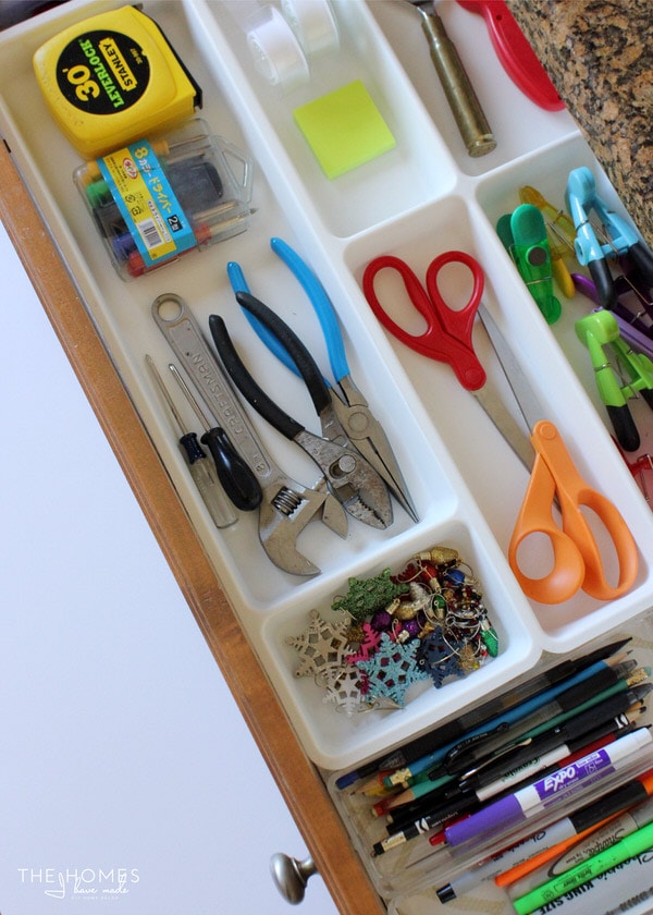 Junk drawer organized with IKEA drawer dividers