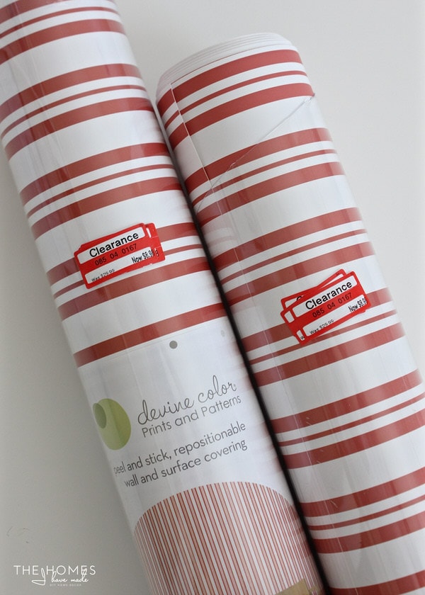 2 rolls of red and white striped wall paper