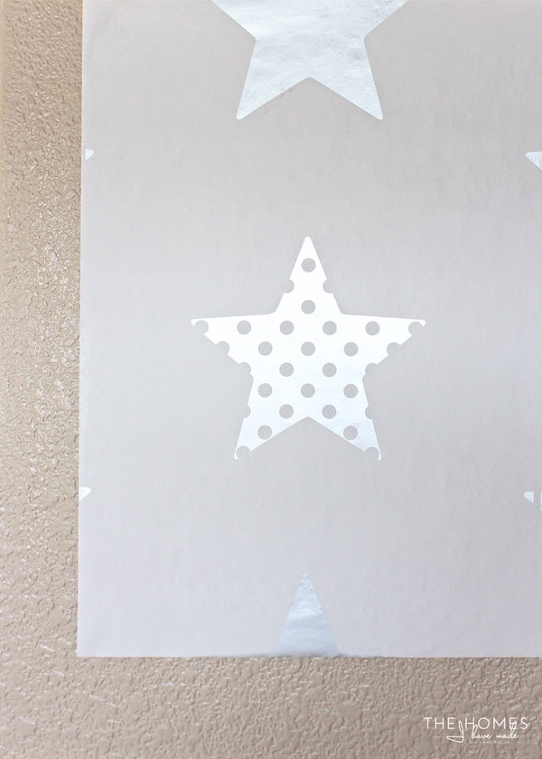 star printed wall paper on textured walls