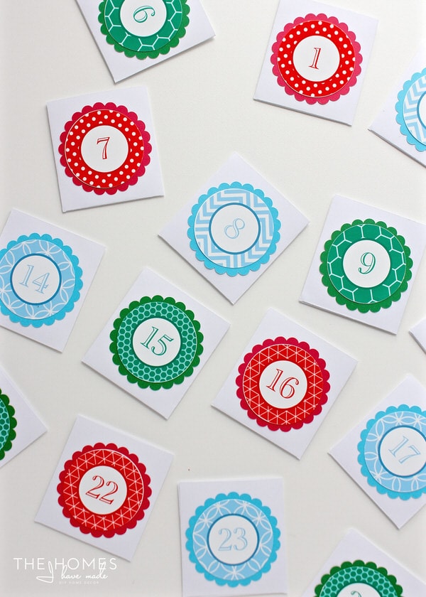 Use the Cricut Explore to create a fun and kid-friendly DIY Advent Calendar. Each day, pull down an envelop to reveal a letter in a hidden holiday message!