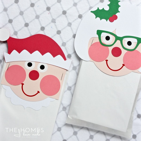 Christmas Treat Bag Toppers that look like Santa and Mrs. Claus