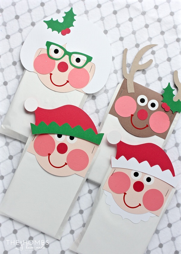 Christmas Treat Bag Toppers that look like Santa, Mrs. Claus, Elf, and Reindeer