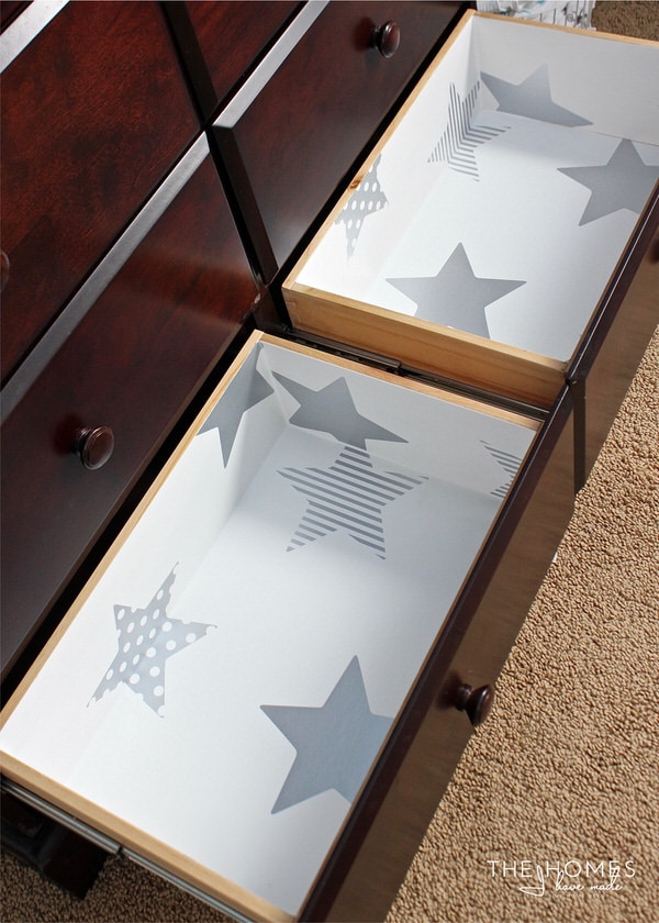 Learn how to line drawers with wallpaper for a great pop of pattern with professional-looking results!