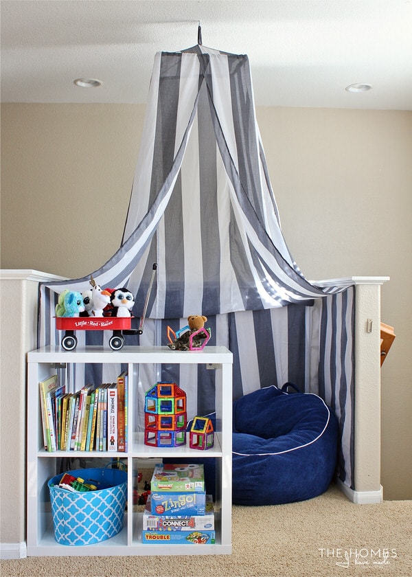Have an awkward bump out and don't know what to do with it? See how easy it is to turn it into a cozy little reading nook for kids!