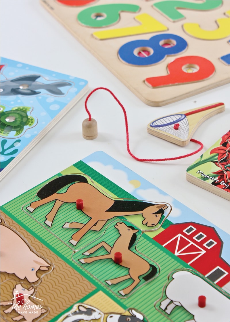 Vertical image of wooden kid puzzles