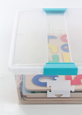 Kids' puzzles can often be bulky and unruly. Check out these smart ideas for organizing wooden kid puzzles!