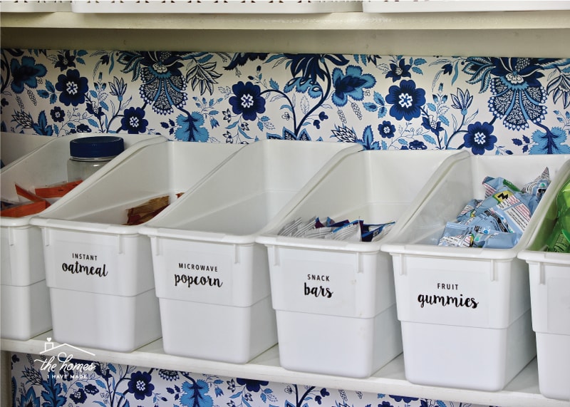 Give your pantry some personality and pizzazz by adding patterned wrapping paper to the back with this easy tutorial.