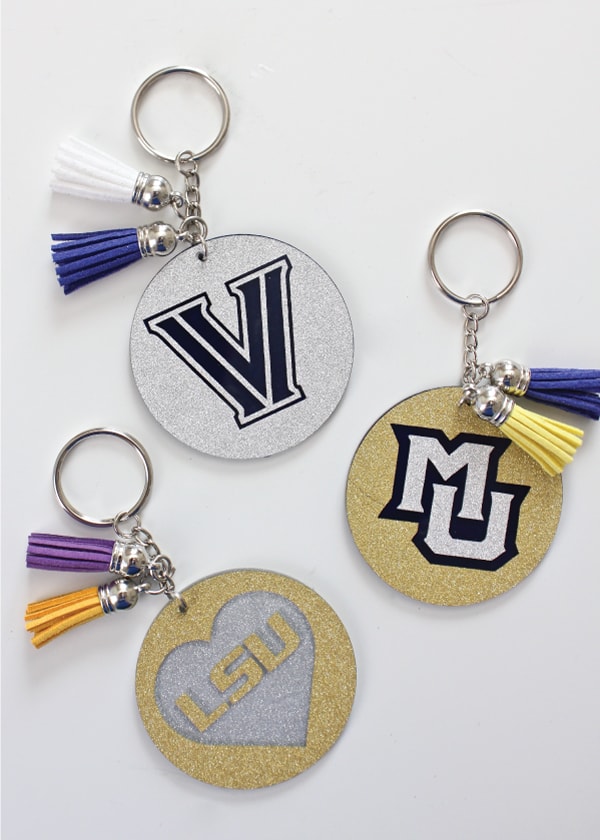 Show your school spirit with these awesome keychains made with glitter vinyl - perfect for grads, alumni, sororities, and more!