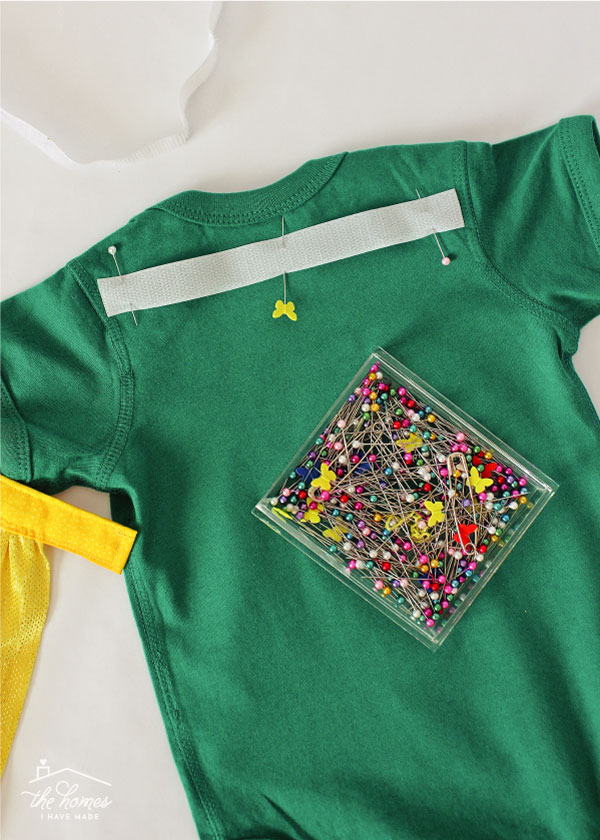 Ready to dress your little one as a superhero? This tutorial will show you how to make a cape for a baby onesie!