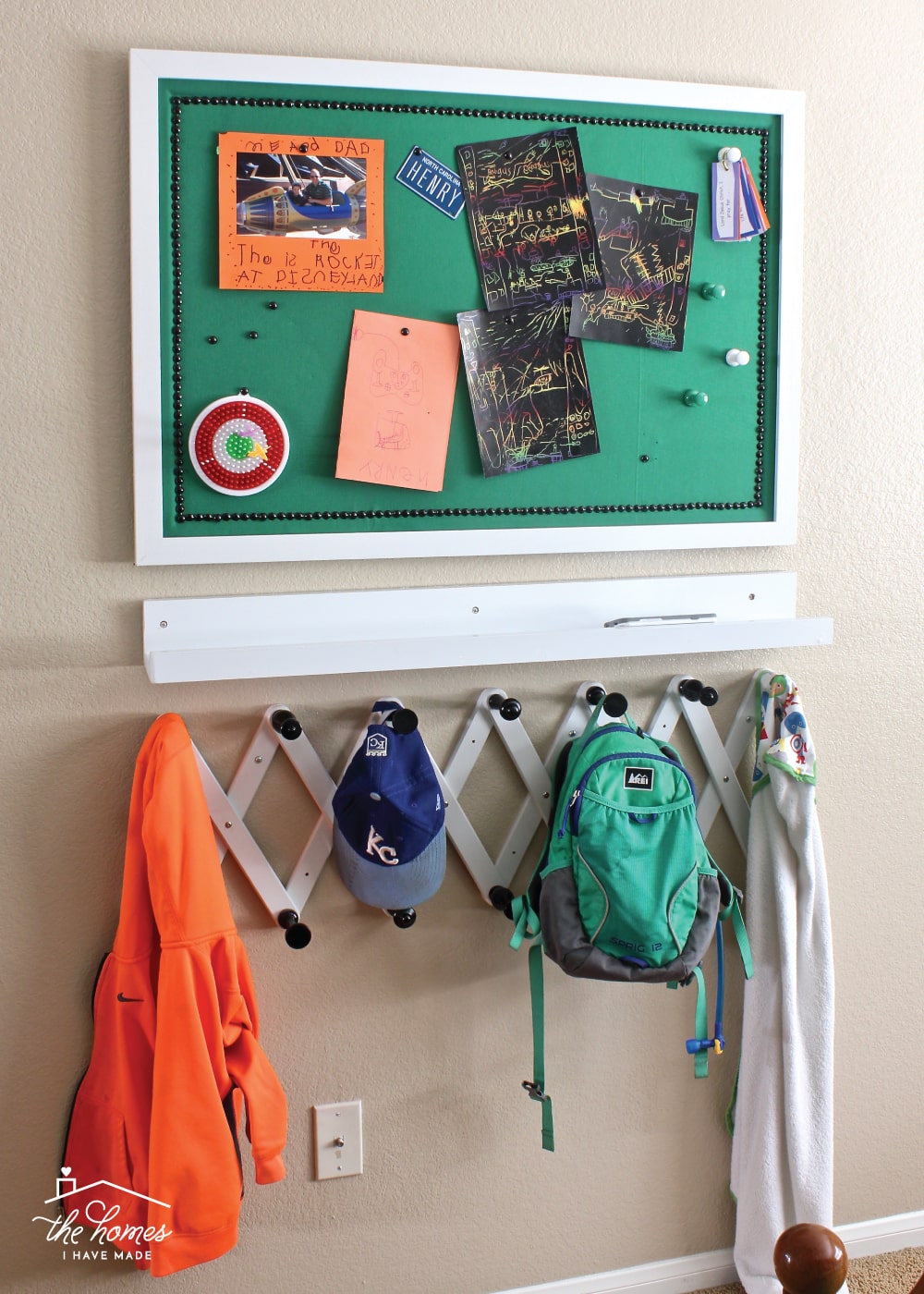 Give a basic bulletin board an easy, inexpensive and stylish upgrade with fabric and nailhead trim!
