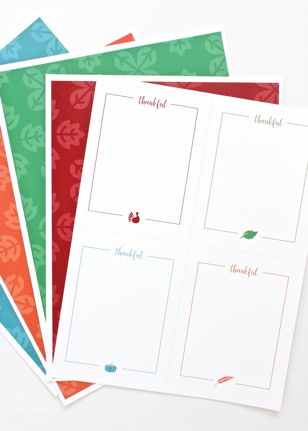Thankful Cards, printed but not cut, with assorted scrapbook papers.
