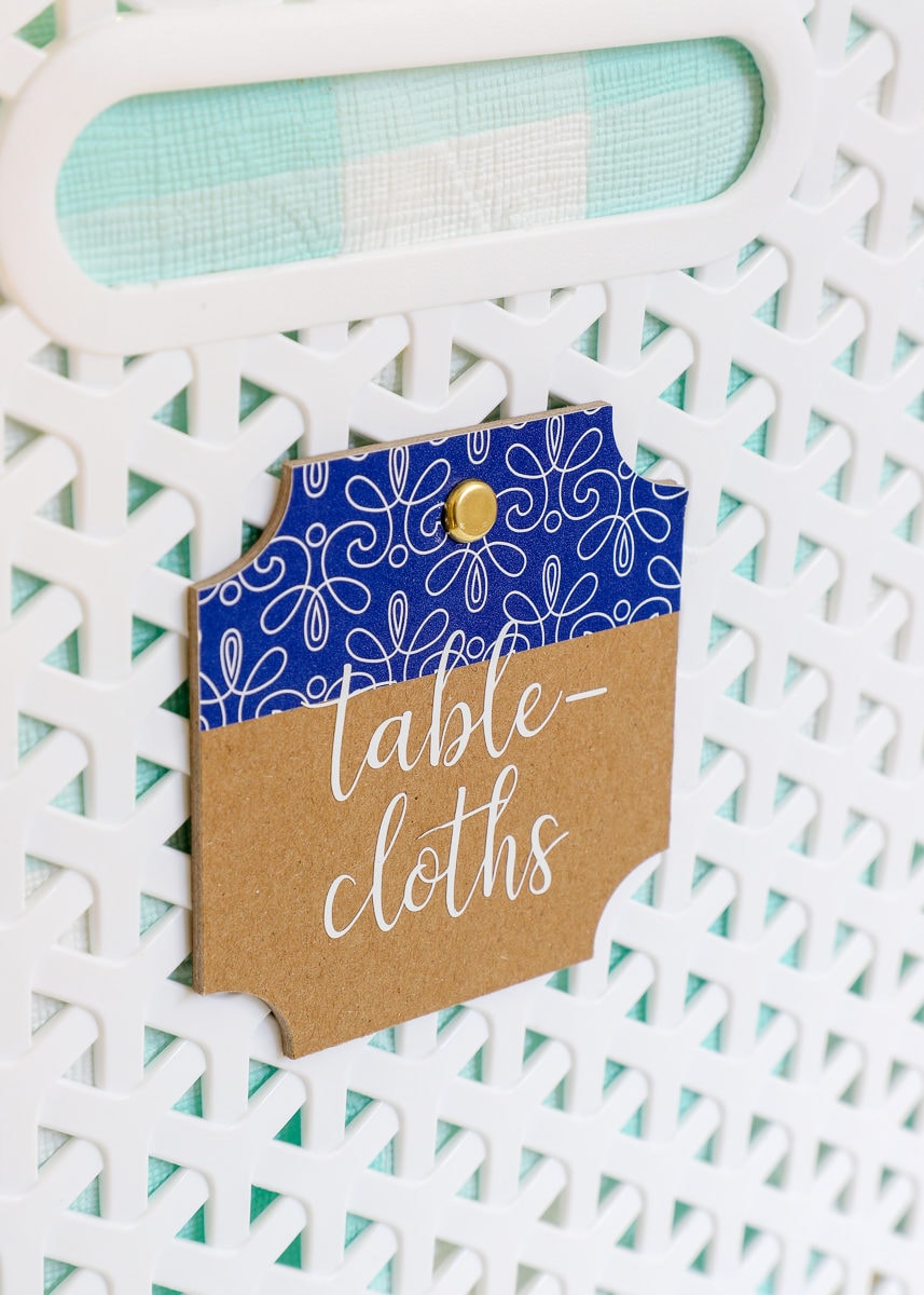 Chipboard label on a white basket