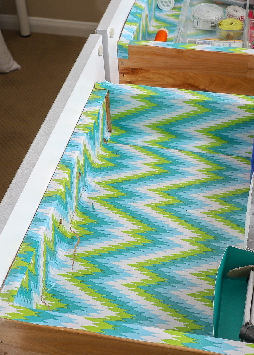 An drawer lined with patterned contact paper