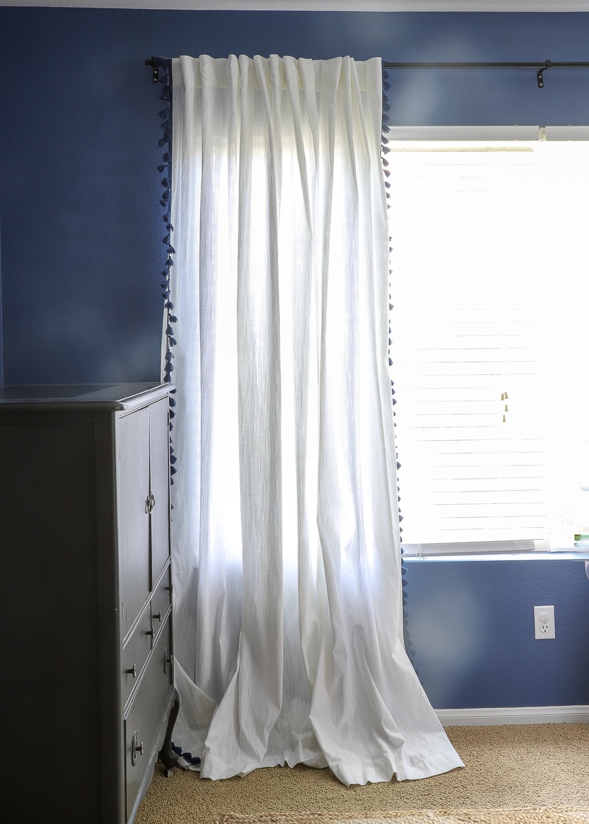 white curtains in front of a window