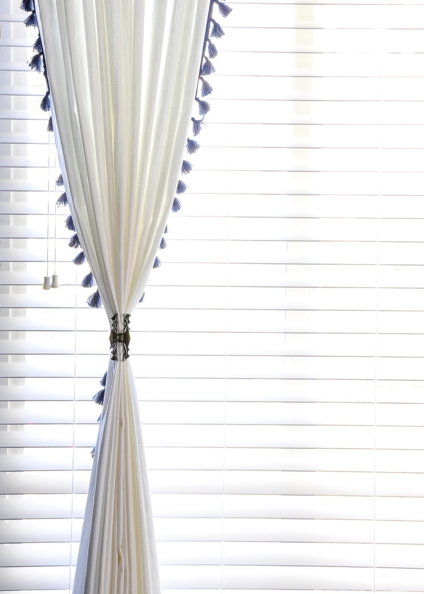 Are your store-bought curtains too narrow for your windows? Widen your curtains with this really easy fix!