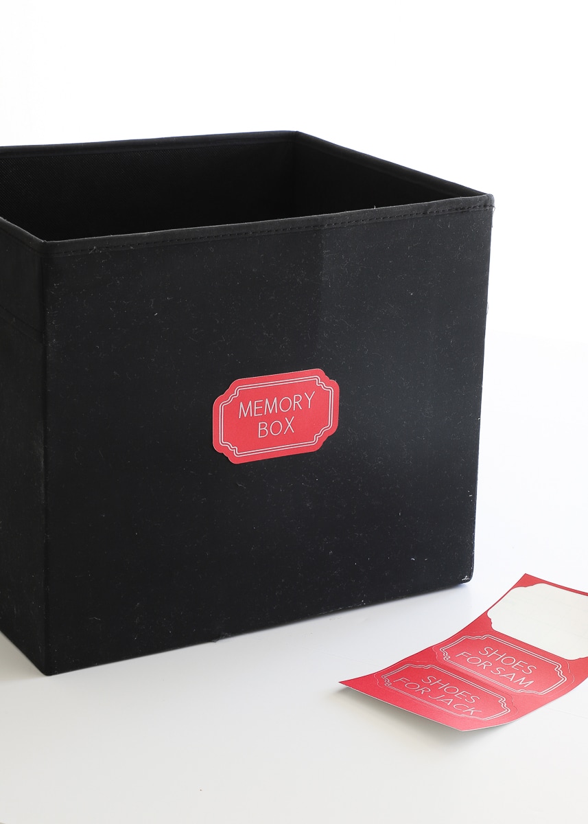 black memory box with a bright red label