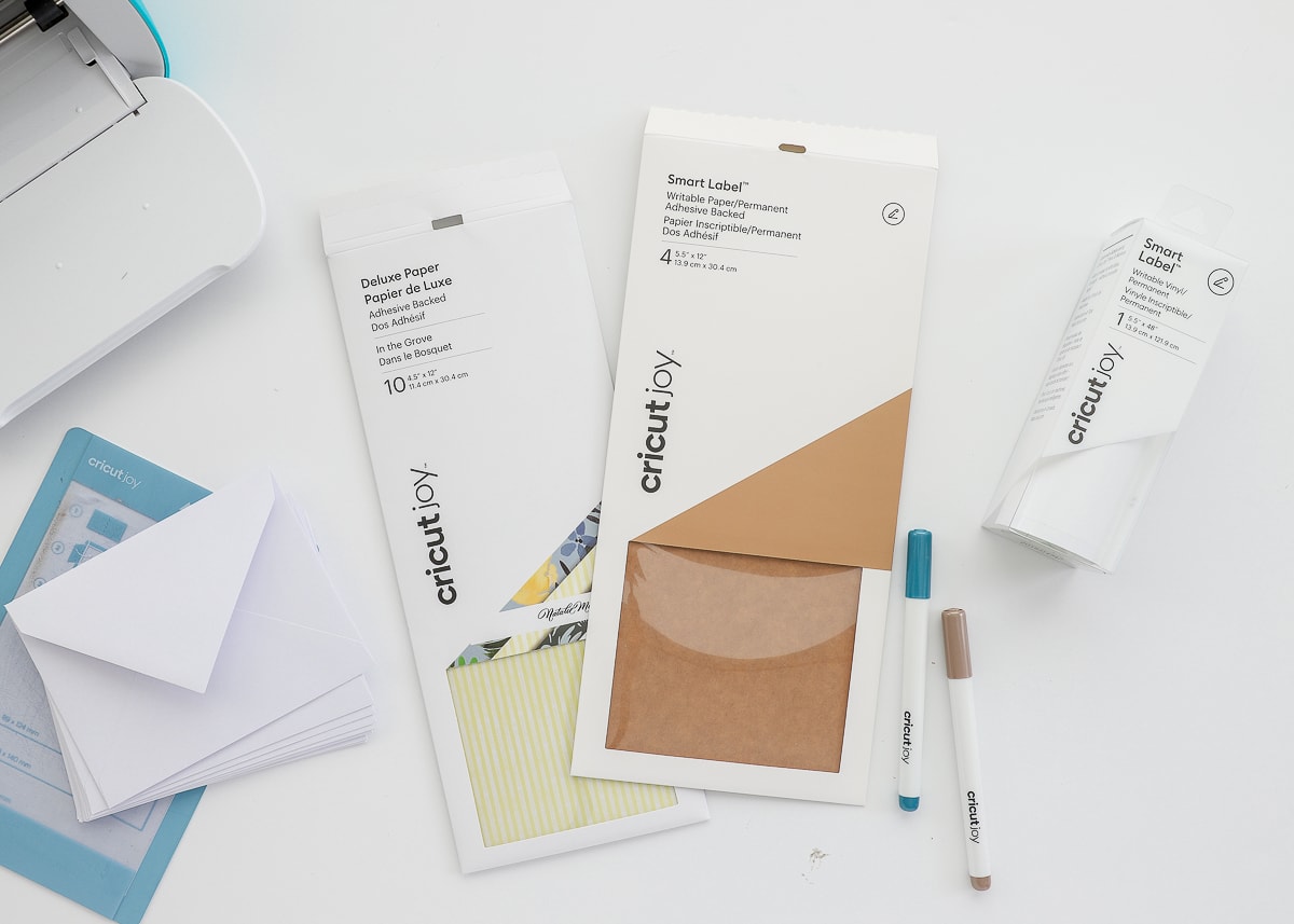 Cricut Joy smart label, cricut pens, and blank envelopes