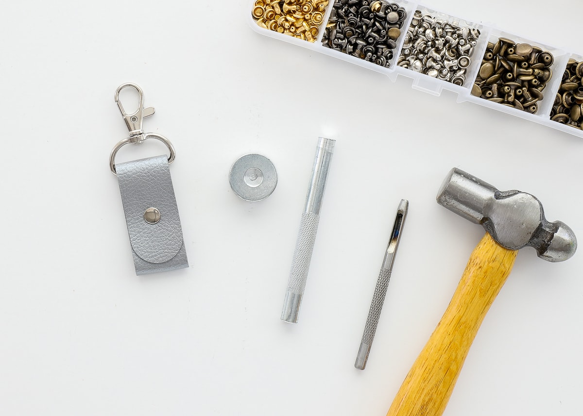 Tools needed to create a faux leather keychain made with a Cricut machine