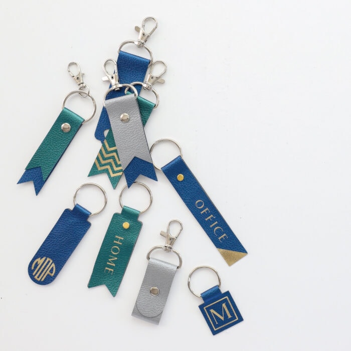 Personalized keychains made with a Cricut machine.