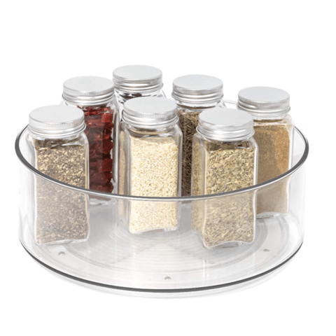 A clear turn table with spices