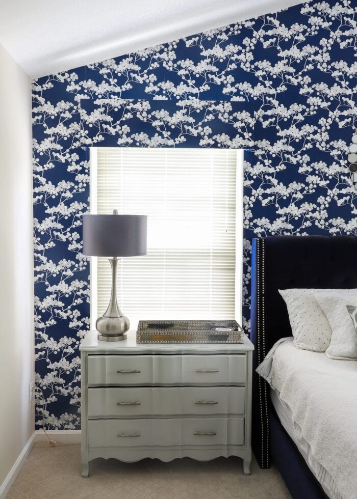 this simple blue window valance is made with foam board and wallpaper