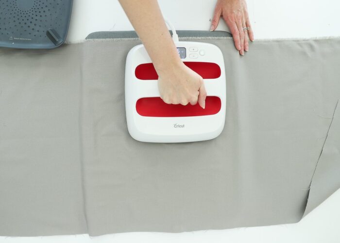 Place Cricut Smart Iron-On Design onto pillow and heat with Easy Press