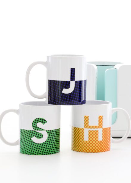 Split monogram mugs in blue, green and orange