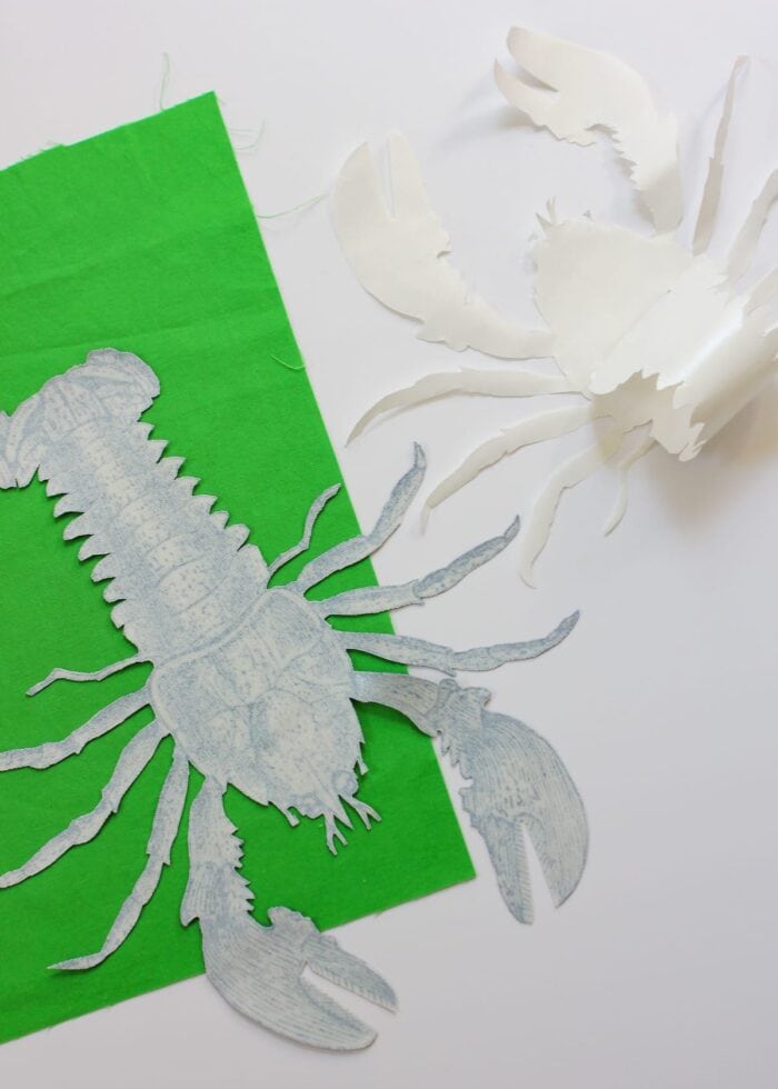 Paper backing removed from sea creature cut out