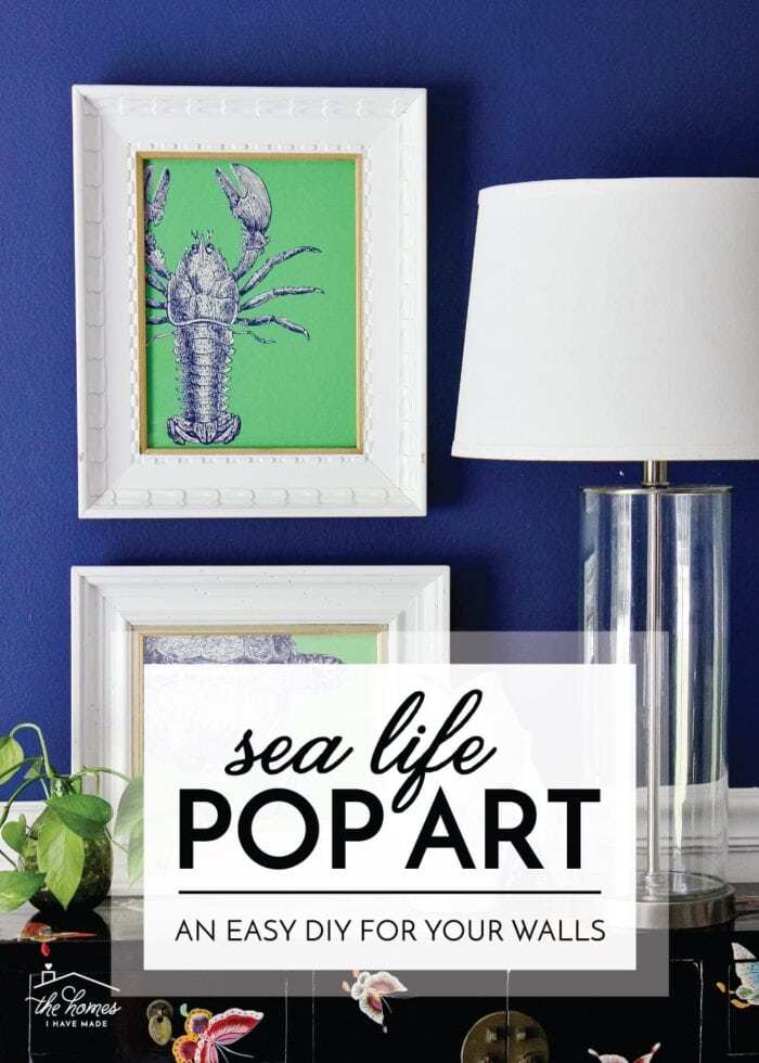White frames with blue and green sea life pop art on a blue wall