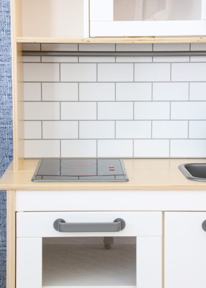 IKEA Play Kitchen with Subway Tile backsplash made from Cricut Vinyl