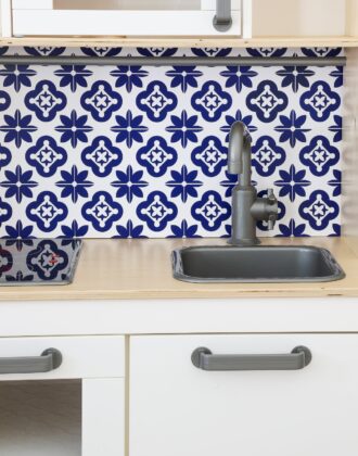 IKEA Play Kitchen with tile backsplash made from Cricut Vinyl