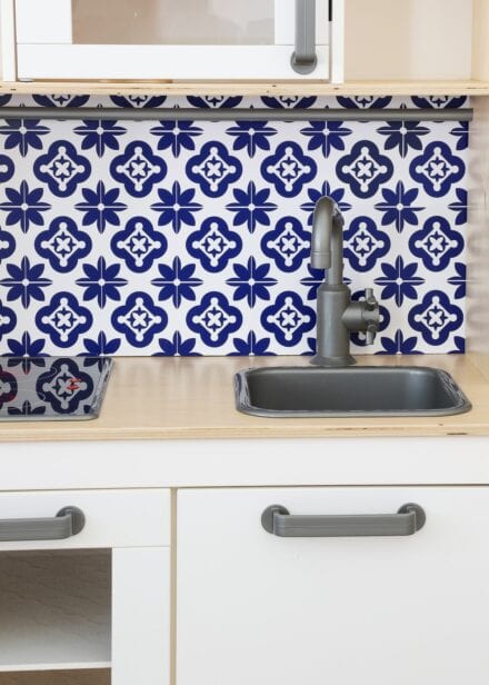 IKEA Play Kitchen with tile backsplash made from Cricut Vinyl