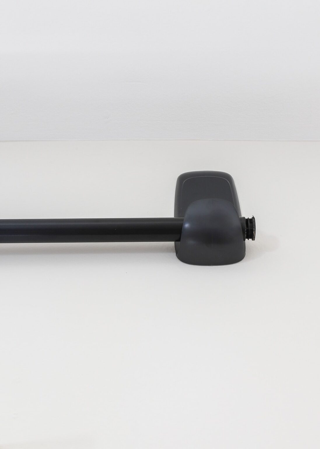 How to Hang a Curtain Rod Without Drilling into the Wall