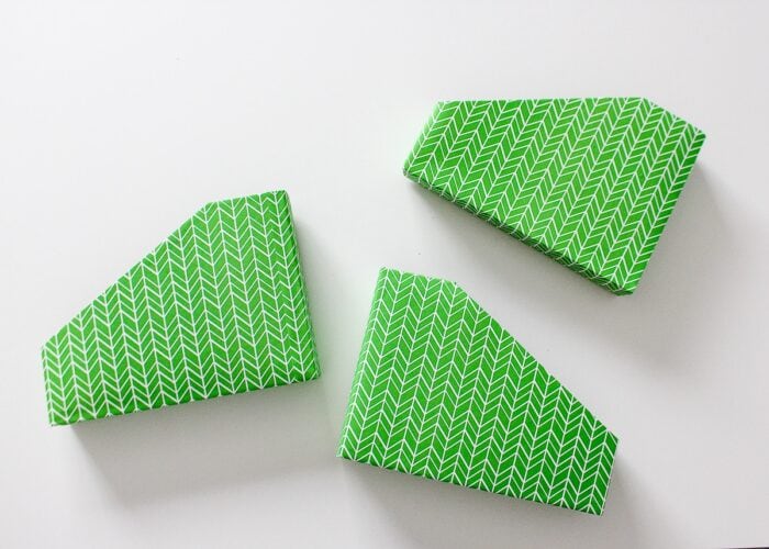 Cut-down cereal boxes wrapped in green wrapping paper.