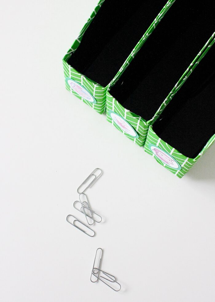 DIY Book Organizers shown with metal paperclips holding them together.
