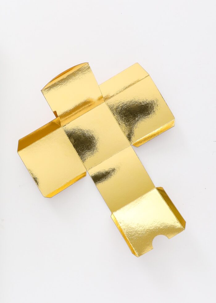 3D box cut from gold foil Kraft board.