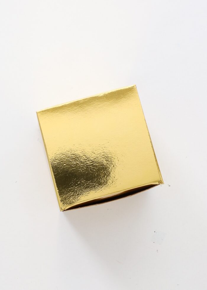 3D box cut from gold foil Kraft board.
