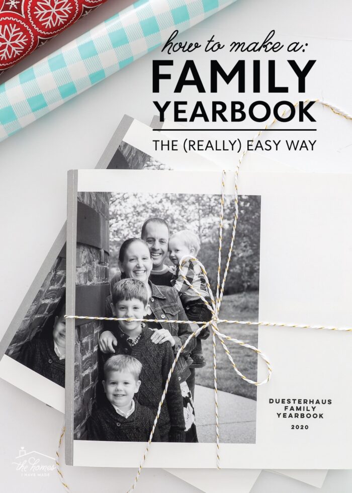 Black-and-white Family Yearbooks shown with red, blue, and green Christmas wrapping paper.
