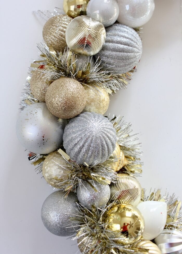 Gold, silver, and white ornament wreath