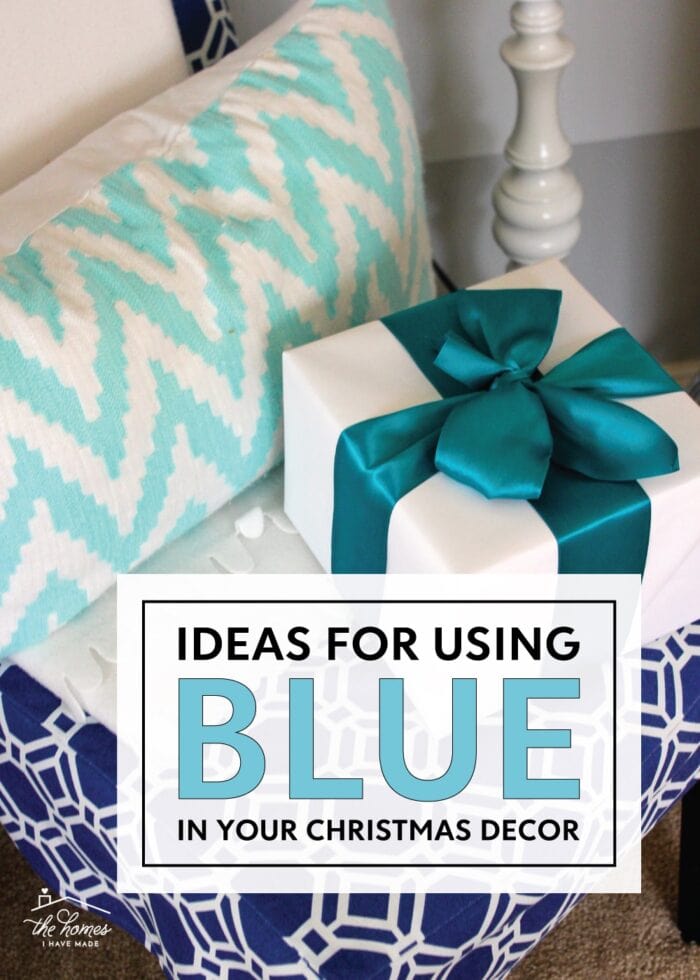 White present with turquoise bow on a chair.