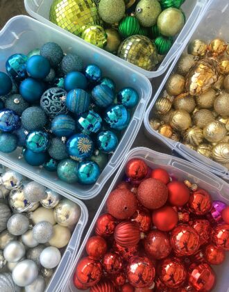 Christmas ornaments organized by color