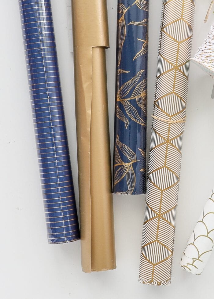 Rolls of blue and gold wrapping paper