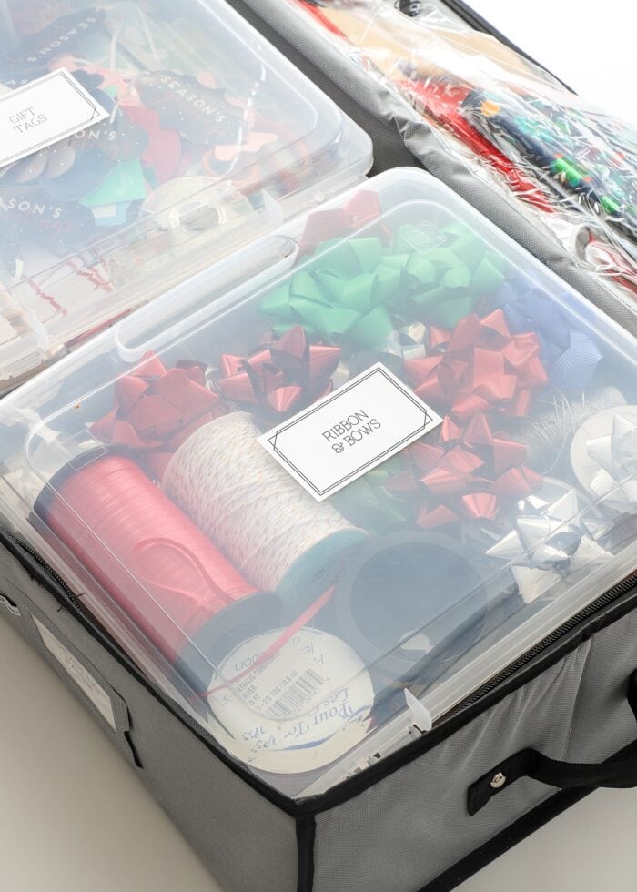 Ribbons and bows stored in a plastic tote