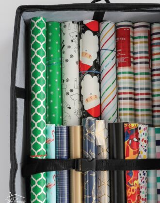 Gift wrapping supplies stored in a wrapping paper storage tote