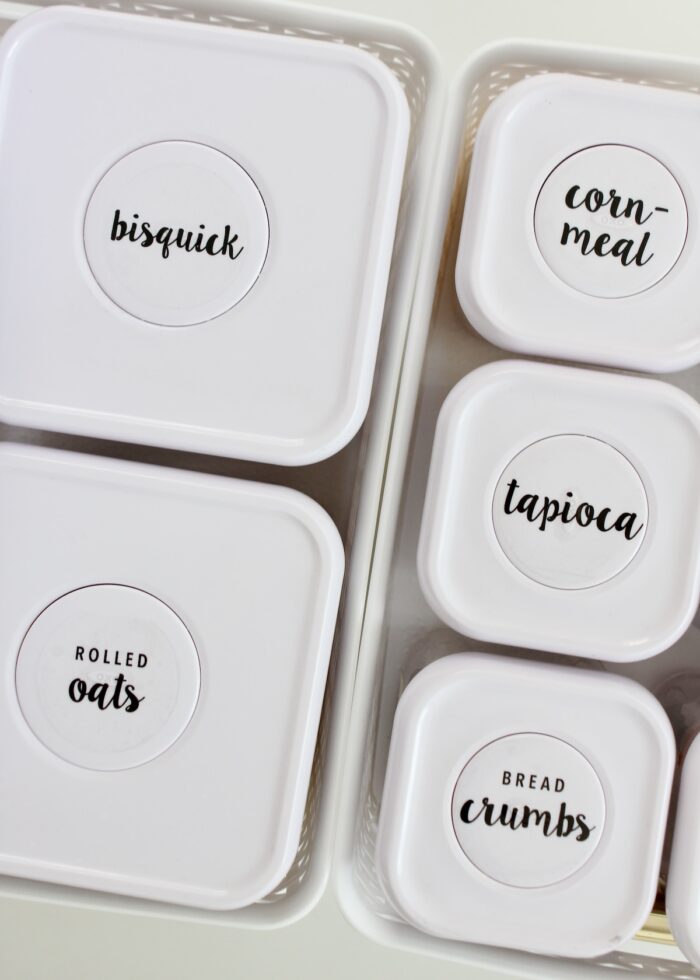 White food storage containers with black labels