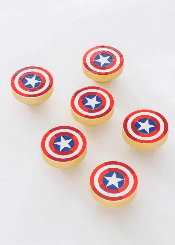 Wooden knobs with Captain America shield design