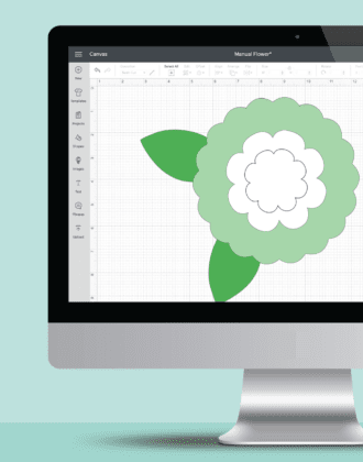 iMac showing a Cricut Design Space screenshot of a green flower